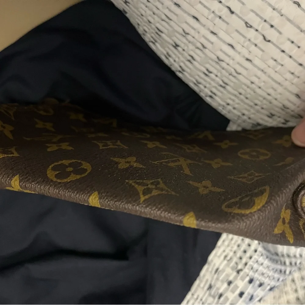 Louis Vuitton Leather Wristlet In Used Condition
